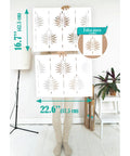 Person holding Fern Wall Stencil Set 2 Pack 17 By 22.5 Inches for painting large patterns indoors, featuring fern design.