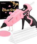 Pink Dual Temp Hot Glue Gun Kit 60W 100W with 15 Glue Sticks and pad, featuring 7/16-inch hot glue gun for crafts and repairs.
