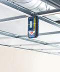 LR8 165 Ft Red And Green Beam Line Laser Receiver mounted on metal framework in construction setting.