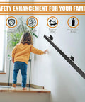 Child using Heavy Duty 14 Foot Wall Mount Stair Handrail Built Like A Tank Steel Rail Matte Black for safe support on stairs.