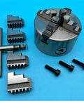 Heavy Duty 100mm K12 Four Jaw Lathe Chuck Self Centering Mini Metal Scroll Chuck For Precision Turning And Milling Operations setup with jaws.