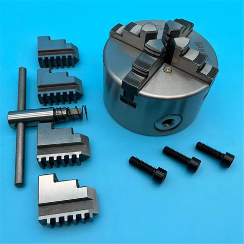 Heavy Duty 100mm K12 Four Jaw Lathe Chuck Self Centering Mini Metal Scroll Chuck For Precision Turning And Milling Operations setup with jaws.