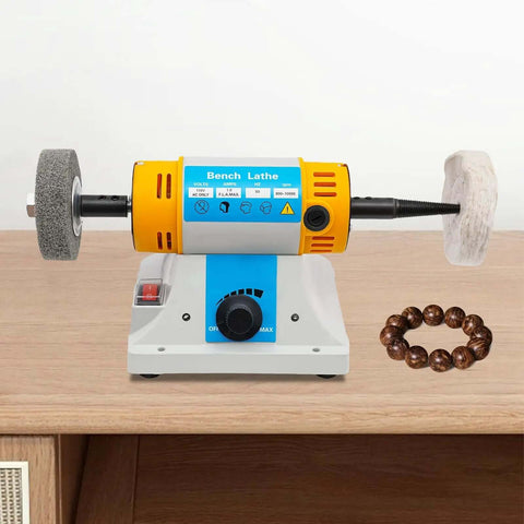 Pro Grade Bench Top Polisher And Grinder For Sanding Grinding And Polishing With 320W Motor And Variable Speed 800 To 10000 RPM 110V Yellow Industrial Tool Includes A Full Accessory Kit For Workshops Makers And DIYers on a wooden workbench.