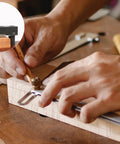 User demonstrating Badass 2 Pack Large Bench Holdfast Clamps 20mm Quick Acting Dog Hole Vise on workbench with tools.