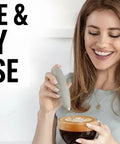 Woman using Milk Frother Handheld Electric Whisk For Creamy Foam, Fast Coffee Shop Style Froth, 13,000 RPM With 25 Spirals, Black.