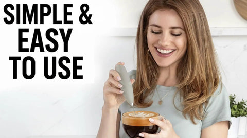 Woman using Milk Frother Handheld Electric Whisk For Creamy Foam, Fast Coffee Shop Style Froth, 13,000 RPM With 25 Spirals, Black.