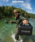 Man holding 80W Portable Bluetooth Speaker With Big Bass And Rugged Outdoor Vibe, IPX6 Waterproof, in outdoor setting