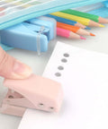 Using Three Piece Mini Hole Puncher Set with Six Sheet Capacity for ID Cards, Chipboard, Arts and Crafts in home or office setting