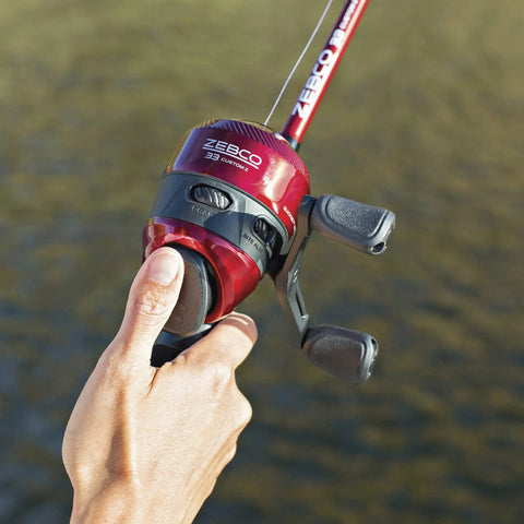 Close-up of Custom Spincast Reel And Rod Combo With 6 Foot Two Piece Fiberglass Rod EVA Handle Quickset Anti Reverse Bite Alert Red Finish Size 30