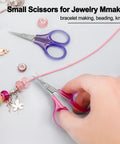Hand using Tiny Travel Scissors 3 Inch TSA Compliant With Sheath Ultra Sharp All Purpose Small Craft Scissors For Detail Work