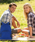 Royal blue backpack from Two-Pack Lightweight Foldable Backpack Set Water-Resistant Packable 20L Travel Hiking Bags for Camping shown at picnic