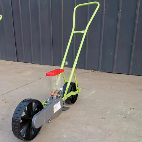 Compact Manual Garden Seed Spreader Workhorse And Planter Tool For One Row Seed Distribution handheld seeder on wheels