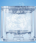Compact Automatic Countertop Dishwasher With Smart Quick Dry And Sleek Led Touchscreen For Plug And Play Setup And No Sweat Kitchen Cleanup showcasing water splashes inside.