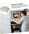Man installing 12 Pieces Mica Sheets For Microwave Oven Waveguide Cover Heat Resistant Fireproof Insulation Pads in kitchen