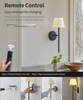 Rechargeable Battery Wall Sconces Set Of Two Black Cordless Lights For Modern Homes No Sweat Install showing remote control and mounting steps.