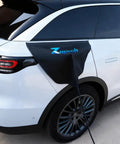 Heavy Duty Ev Charger Port Cover Shields Your Socket From Rain Snow Ice And Tough Uv Rays With A Solid Magnetic Grip on a white electric vehicle.