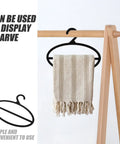 10 Pack Black Plastic Scarf Organizer With Rotating Swivel Design For Closet Storage Space Saving Multi Layer Hanger To Kick Clutter To The Curb And Keep Your Favorite Threads Organized Daily displaying a beige scarf.