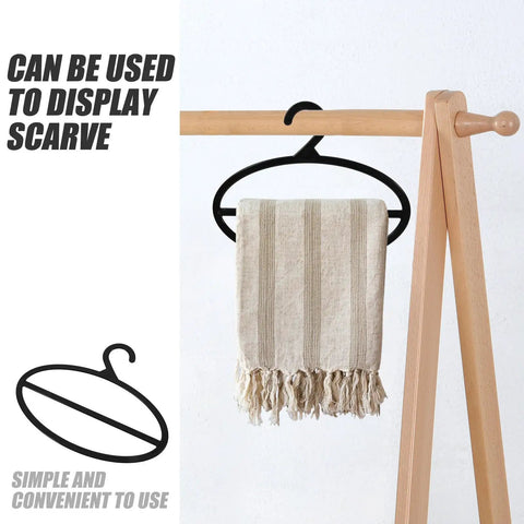 10 Pack Black Plastic Scarf Organizer With Rotating Swivel Design For Closet Storage Space Saving Multi Layer Hanger To Kick Clutter To The Curb And Keep Your Favorite Threads Organized Daily displaying a beige scarf.