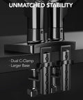 FlowLift Dual Monitor Stand For 13 To 32 Inch Screens with dual C-clamp base for stability, mounting on edge of desk.