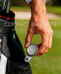 Man holding MagSafe Golf Cart Phone Holder With 36x N55 Magnets near a golf bag on the course.