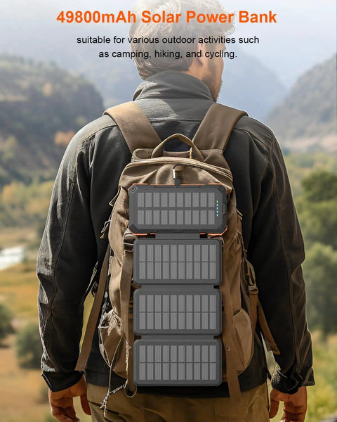 Hiker with Massive 49800mAh Solar Power Bank With Four Built In Cables And Four Foldable Panels PD 22W Fast Charge USB C Input And Output Flashlight