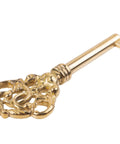 Solid Brass Skeleton Key with ornate handle, 3-3/16 inches, sturdy cast brass design, ideal for vintage cabinet doors.