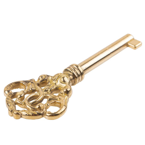 Solid Brass Skeleton Key with ornate handle, 3-3/16 inches, sturdy cast brass design, ideal for vintage cabinet doors.