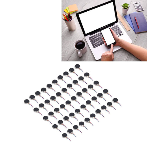 Tiny 50Pcs Mini Vibration Motors Set, DC 3V 10x2.7mm Low Noise Micro Vibrating Motors displayed on a desk with laptop and phone.