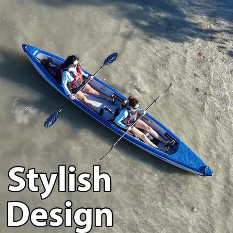 Two people paddling a Razorlite 473rl Inflatable Drop Stitch Kayak Pro Package With Ultra Portable Rigidity Paddles Up To 5 MPH.