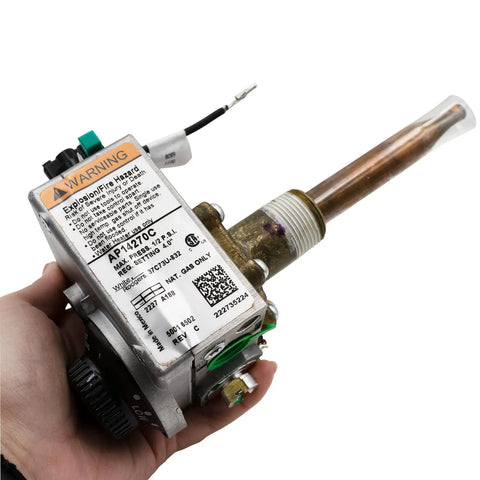 Hand holding Model Specific Natural Gas Water Heater Gas Control Thermostat Replacement SP21195C SP20303D with metal tube