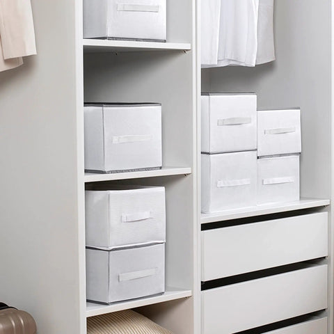Two Pack Upgraded Closet Organizer With Handle, 9 Grid Thick Fabric Storage Box for jeans and sweaters in a white closet