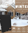 Backflow Preventer Insulation Cover With L Shaped Opening And 2 Way Access For Irregular Pipes Outdoor Sprinkler And Irrigation Valve Cover Winter Freeze Protection 24 By 24 Inches Black in front of snowy house.