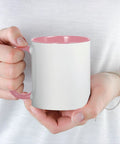 Premium Quality Ceramic Coffee Mug With Dope Golf Cart Graphics Made To Keep Up With Your Daily Grind Ideal For Iced Lattes Or Strong Black Coffee During Your Office Routine held in hand with pink interior.