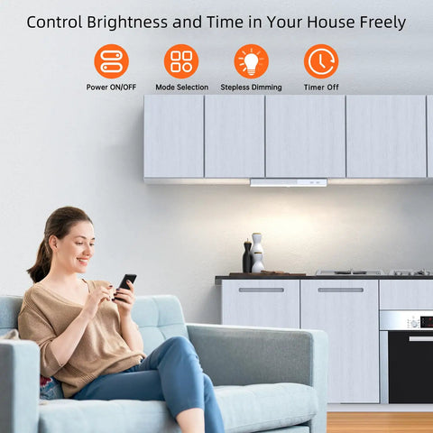 Woman using phone to control Stick Anywhere Closet Light Kit With Motion Sensor 6 Pack 30 LED Dimmer Under Cabinet Lights