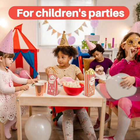 Flat Bottom Popcorn Bags 50 Pack With Individual Servings For Movie Night, Parties, Carnivals, And Halloween on table at children's party