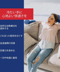 Woman wearing Arthritis Pain Relief Hand Warmer Gloves For Carpal Tunnel Support In Blue relaxing on sofa