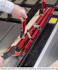 Heavy Hitting 48 Inch Precision Taper Jig For Table Saw With Dead On Accurate Angle Adjustment And Slick Extendable Support For Flawless Woodworking Cuts Made In Usa in use with clamps securing wood.