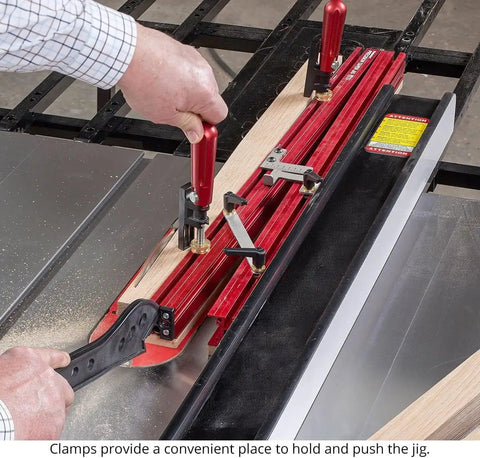 Heavy Hitting 48 Inch Precision Taper Jig For Table Saw With Dead On Accurate Angle Adjustment And Slick Extendable Support For Flawless Woodworking Cuts Made In Usa in use with clamps securing wood.
