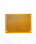 Top view of a 5x7 cm single-sided Bakelite circuit board from the 20 Piece 5 By 7 Cm Yellow Universal Breadboard Prototyping Boards set.
