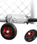 Close-up of Smooth Rolling No Sweat Soccer Goal Dolly With High Lift Puncture Proof Tires, showcasing red wheels and mounting detail.