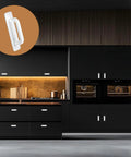 40 Piece White Peel And Stick Cabinet Handles Set With Double Sided Adhesive Strips, ABS plastic door pulls installed on black cabinets