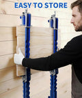 Man using Four Way Glue Up Clamps Keep Boards Dead Flat, 40.5 Inch Panel Clamps to secure wood for alignment.
