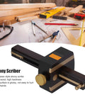 Heavy Duty Top Shelf 8 Inch Adjustable Marking Gauge Featuring Slick Triple Needle Scribe For Tight Layouts And Gotta Have Woodworking Carpentry Projects Now on a carpentry table with tools.