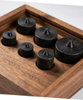 Heavy Duty Machine Shaft End Protectors With Precision Fit For Jjf Gripomatic Pullers, various sizes in a wooden tray.