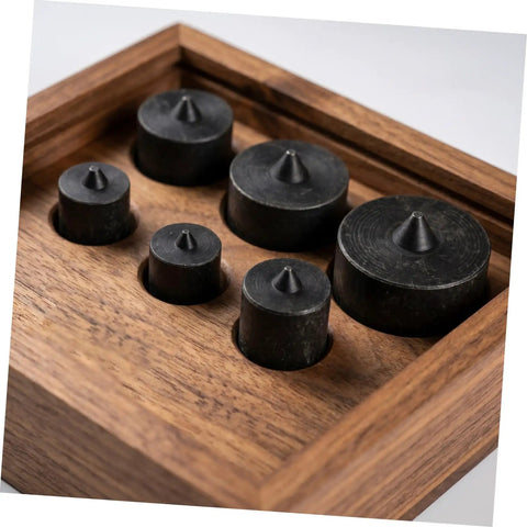 Heavy Duty Machine Shaft End Protectors With Precision Fit For Jjf Gripomatic Pullers, various sizes in a wooden tray.
