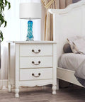 Dope Blue Glass Desk Lamp, 26 Inch Tall With Handcrafted Spiral Body on a white bedside table next to bed