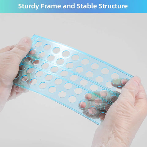 Hands wearing gloves holding a sturdy blue tray component of a Heavy Duty 50 Hole Test Tube Rack for 13, 16, and 18mm tubes.