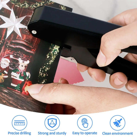 Close-up of a hand using a Heavy-Duty Oval Hole Punch, Metal Handheld Slot Puncher For ID Cards And Paper on colorful card.