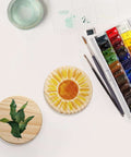 Dicunoy 4-inch round unfinished wood coasters; two wooden coasters with sunflower and leaf designs for crafts