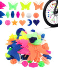 Colorful Bike Spoke Beads Kit For Kids, Durable Plastic Wheel Clips in assorted colors and shapes on bicycle wheel and pile